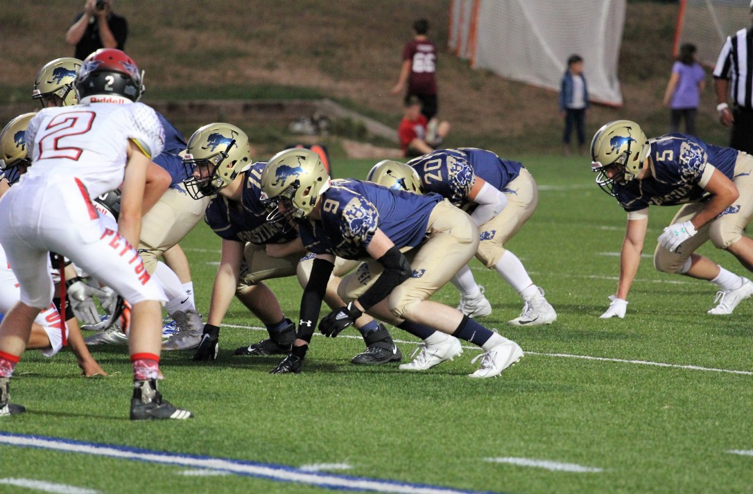 photo courtesy of Jenn Tyler CSCS football. Peyton vs CSCS